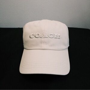 Coach white, red or brown embroidered baseball hat. (Sold separate)